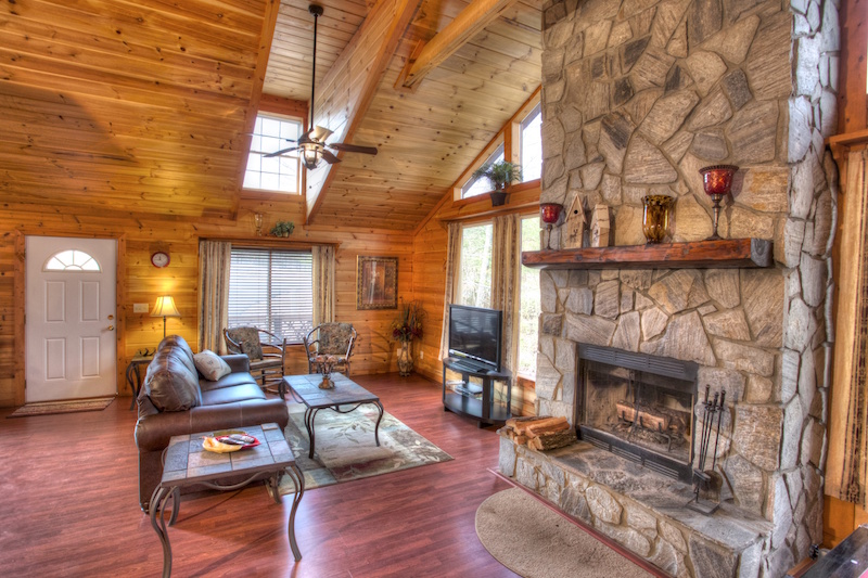 Interior of Twin Falls with wood burning stone fireplace